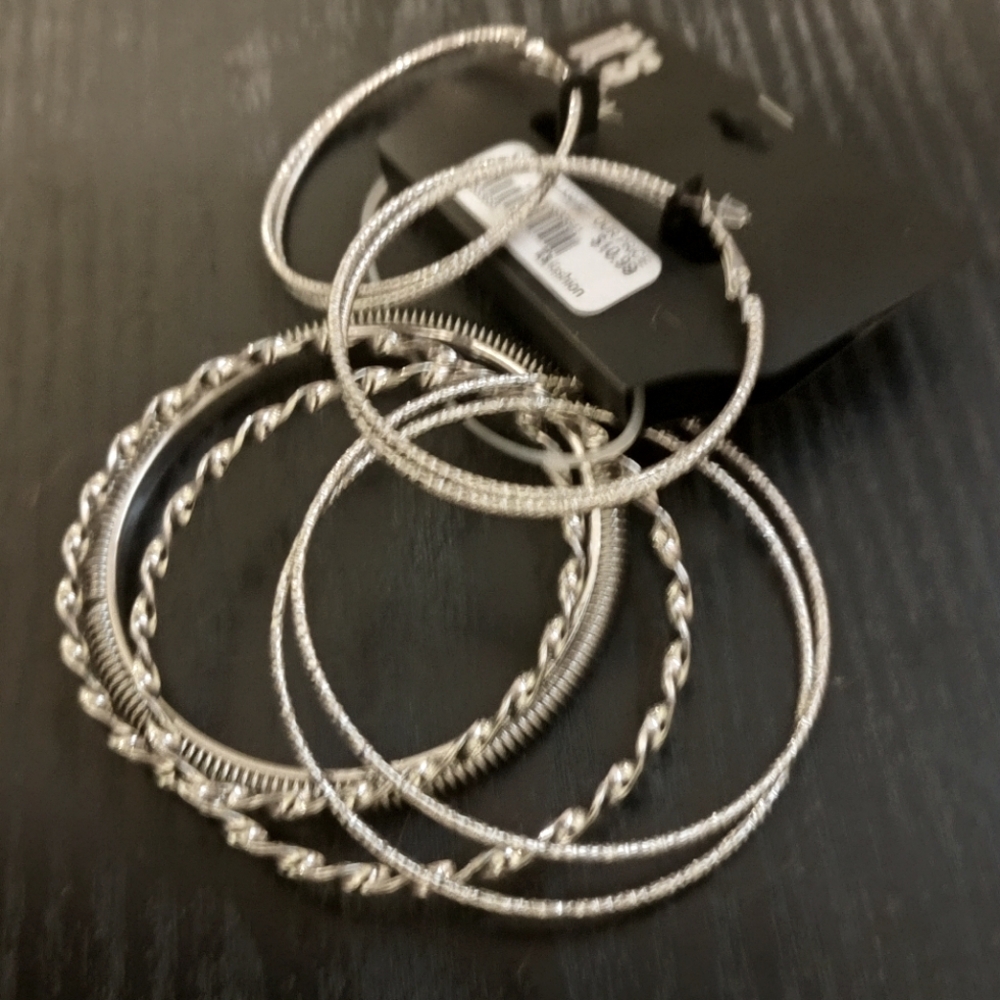 Silver hoop earrings with bracelets matching set